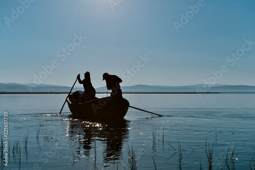 husband and wife performing the fishing profession