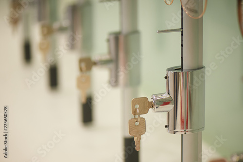 The key in the locker. There are a lot of lockers, a locker room in a fitness club, a medical center, an office, a post office or a Bank.