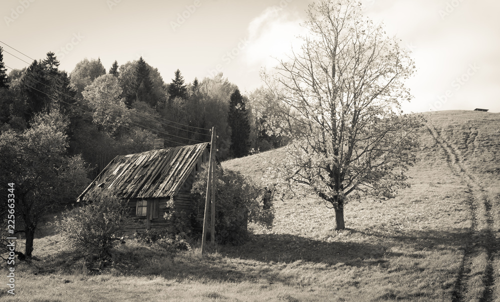 Old abandoned farm house under the hill Old abandoned farm house under the hill