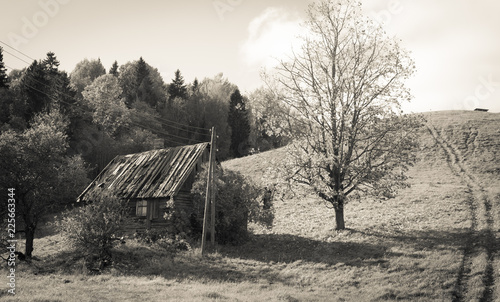 Old abandoned farm house under the hill