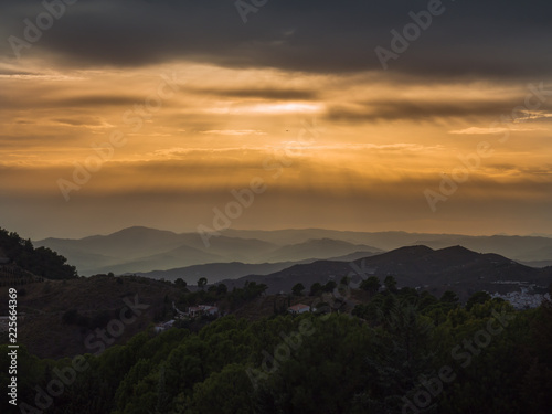 A stormy sunset over the hills of Andalusia Spain