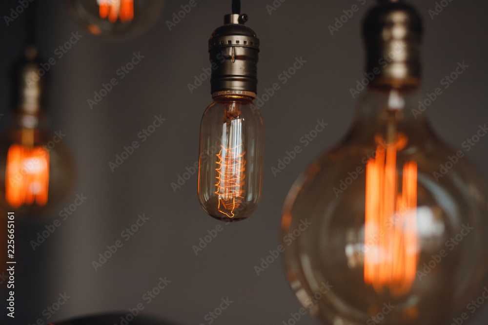 Set edison retro lamp on loft gray concrete background. Set edison retro lamp on loft gray concrete background.