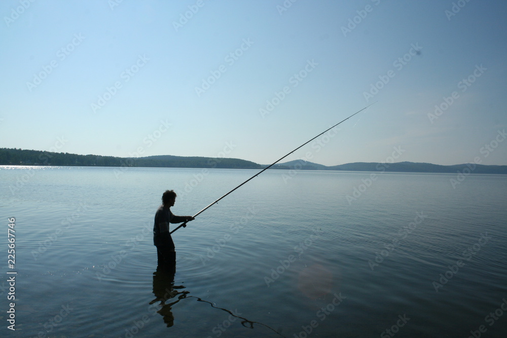 man fishing at sunset man fishing at sunset