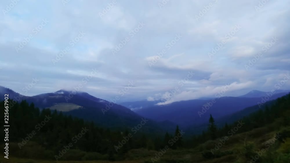 The picturesque mountain on the cloud stream background. time lapse The picturesque mountain on the cloud stream background. time lapse