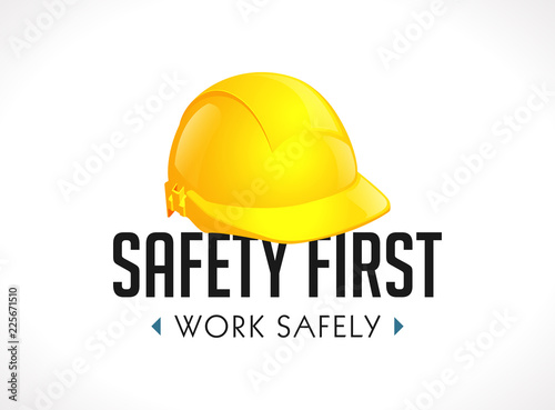 Safety first concept - work safely sign yellow helmet as warning sign

