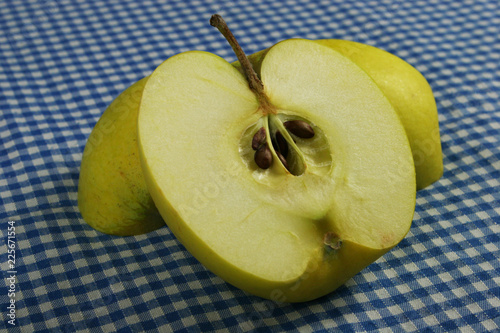 Ripe green apple and slice