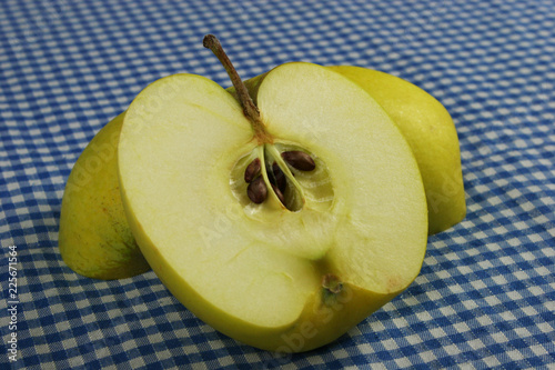 Ripe green apple and slice