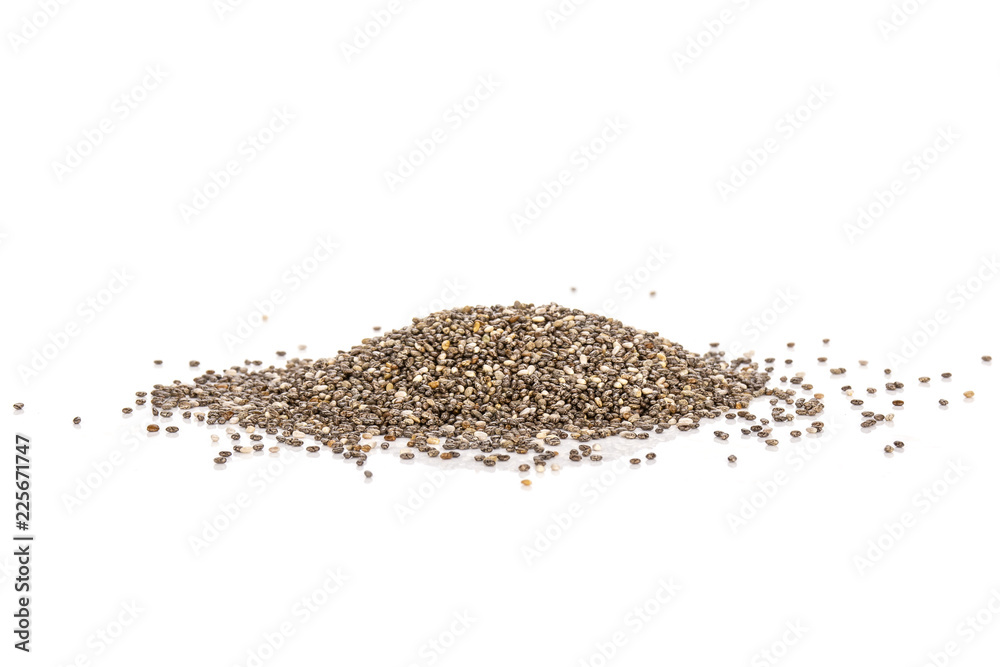 Lot of whole fresh mottled chia seeds isolated on white background Lot of whole fresh mottled chia seeds isolated on white background
