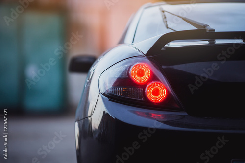 Headlights of sport car. © kucheruk