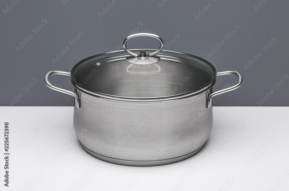 New kitchen pot for cooking soup with lid, isolated. New kitchen pot for cooking soup with lid, isolated.