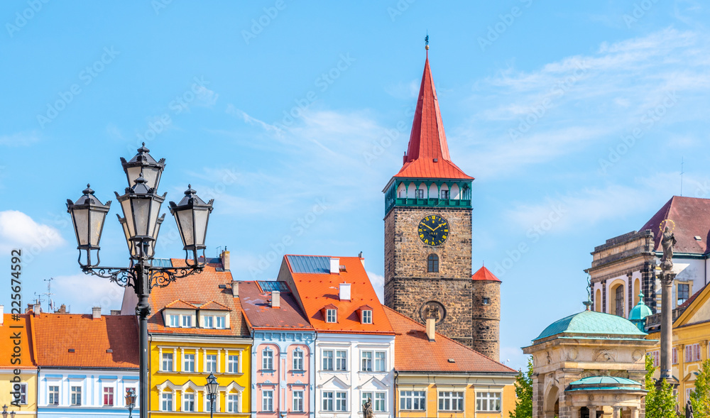 Colorful renaissance houses and Valdice Gate at Wallenstein Square in Jicin, Czech Republic.
