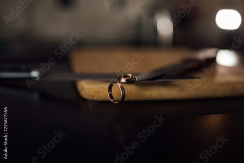 wedding rings on knives