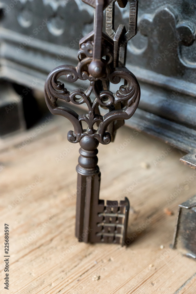 Old big retro metal key to open a box Old big retro metal key to open a box
