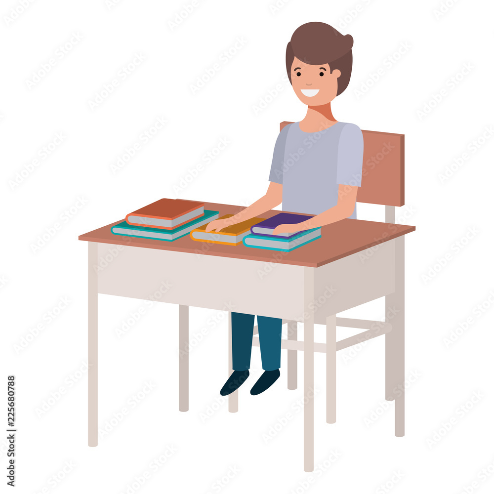 young student boy sitting in school desk