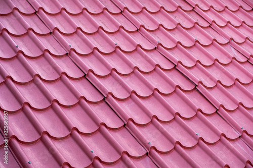 Abstract pattern of red roof tiles