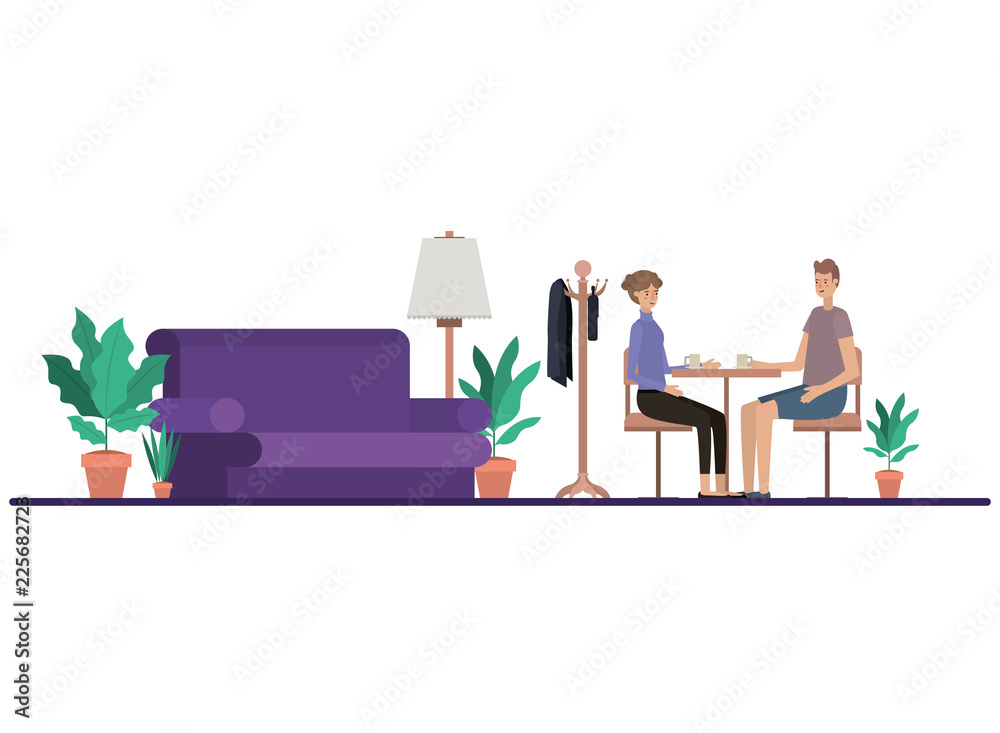 couple drinking coffee in the living room