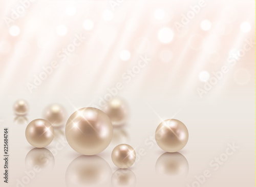 Vector beautiful group of shiny pearls on soft pink background with sparkles and light beams with copy space