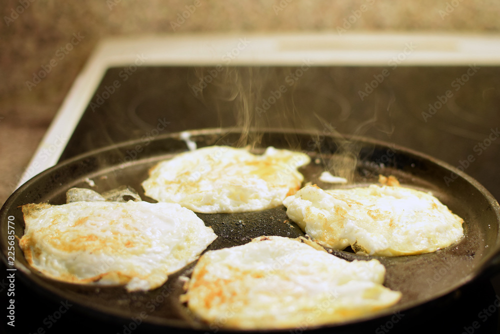 Fried eggs on egg pan, Copy space. Fried eggs on egg pan, Copy space.