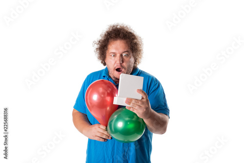Funny fat man with gift and balloons. Happy birthday © Dmitry_Tkachev