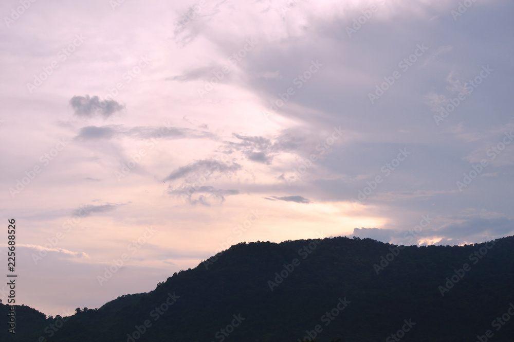 mountain covering by rain cloud on sky