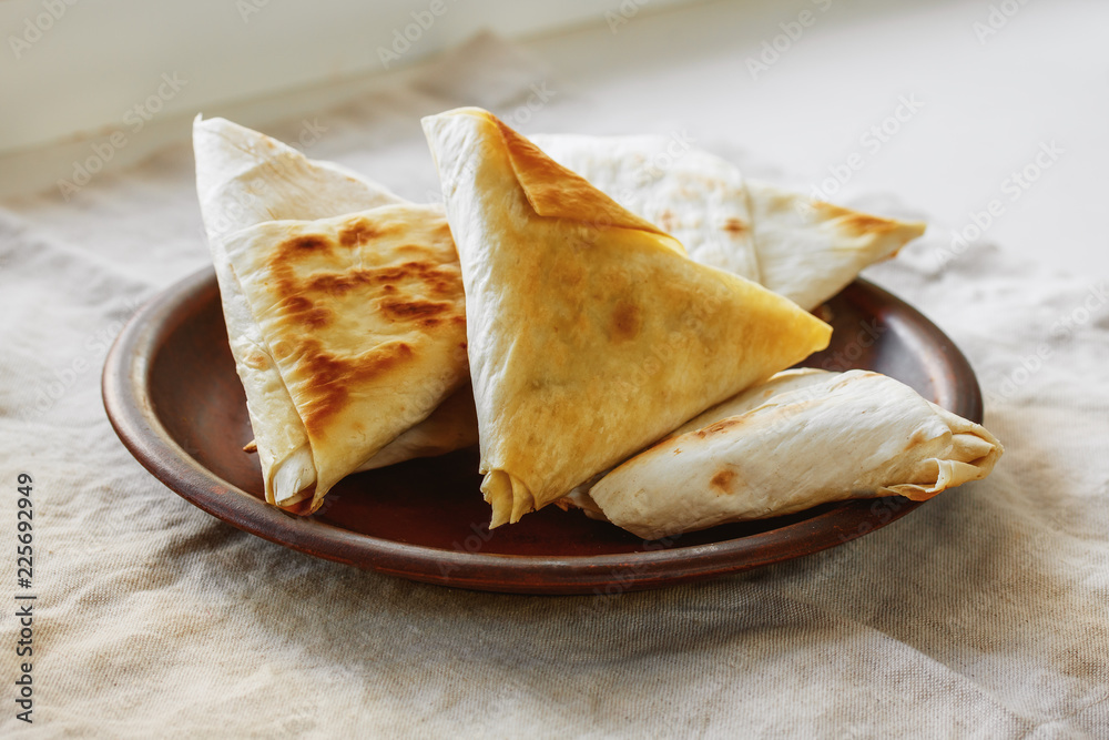 Pita bread with vegetable filling and sauce, fast food, vegan Pita bread with vegetable filling and sauce, fast food, vegan