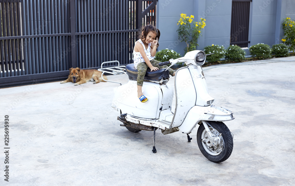 little children sit Play on scooter little children sit Play on scooter