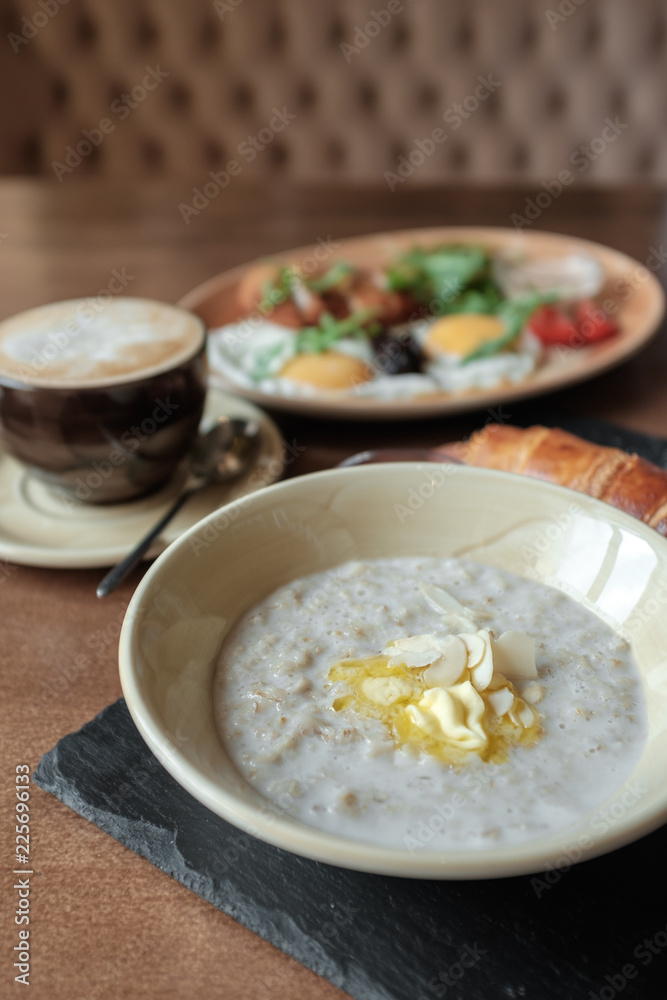 Healthy breakfast with oatmeal and raspberries Healthy breakfast with oatmeal and raspberries