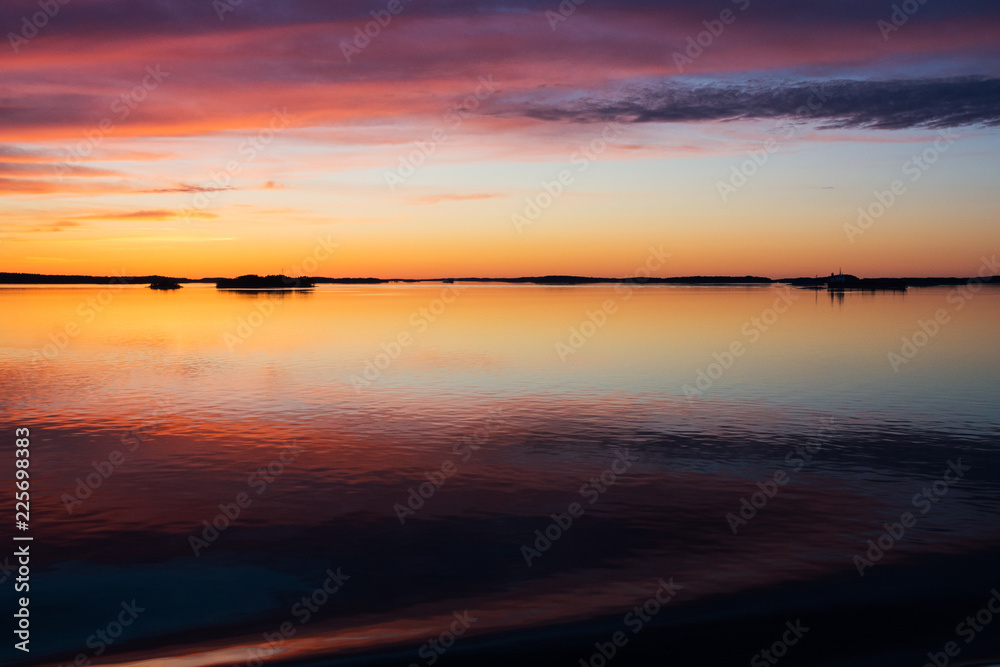 A natural  Dramatic,  blazing   sunset in the Baltic sea. Bright sky and clouds. beautiful seascape as background