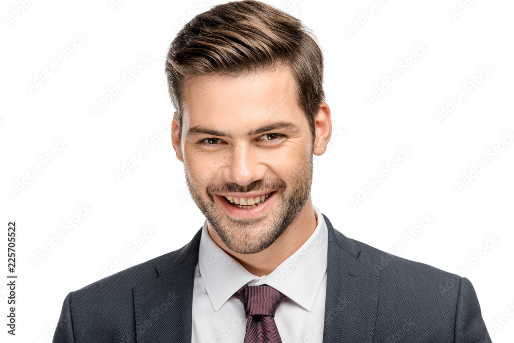 portrait of smiling young businessman in jacket looking at camera isolated on white portrait of smiling young businessman in jacket looking at camera isolated on white