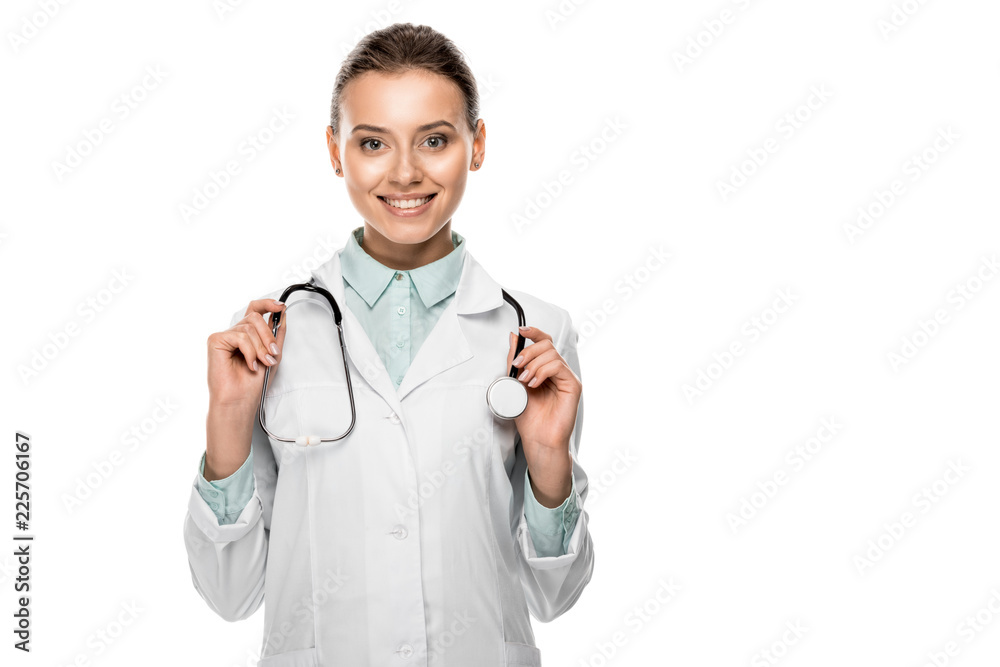 attractive happy female doctor with stethoscope over neck standing isolated on white attractive happy female doctor with stethoscope over neck standing isolated on white