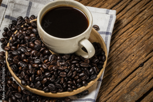 A coffee bean is a seed of the coffee plant and the source for coffee.