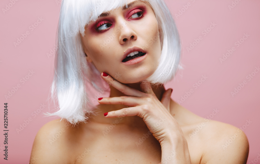 Fototapeta premium Glamorous girl with professional makeup and wig