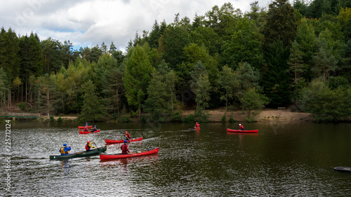 People Kayaking in a Lake
