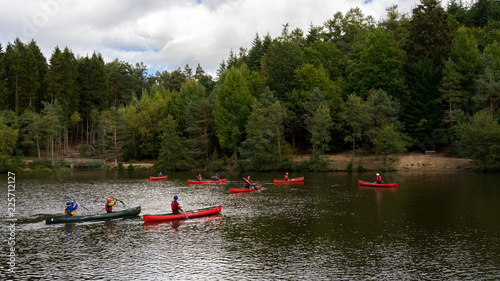 People Kayaking in a Lake