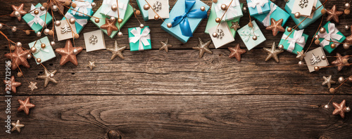 Christmas Decorations and Gifts on a Wooden Background