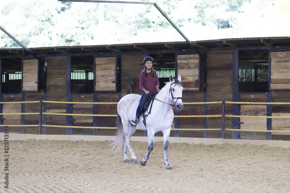 Beautiful Teenager Riding a Horse Beautiful Teenager Riding a Horse