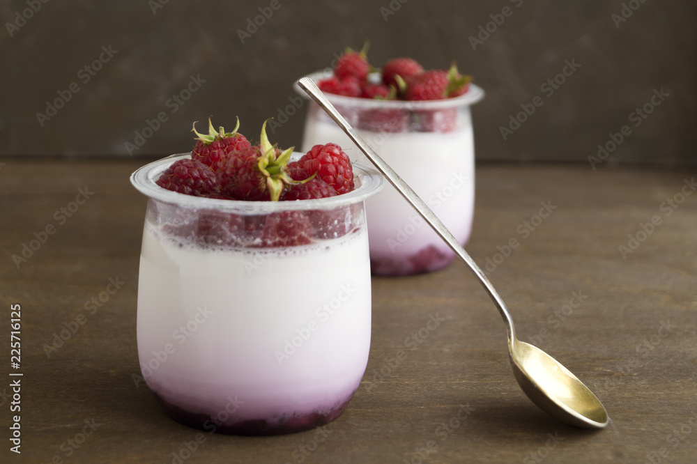 Homemade healthy diet yogurt with raspberries. selective focus Homemade healthy diet yogurt with raspberries. selective focus
