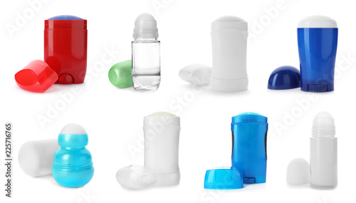 Set with different deodorants on white background