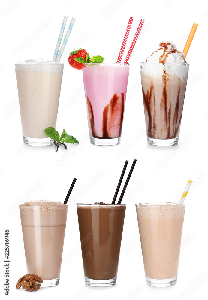 Set with different delicious milk shakes on white background
