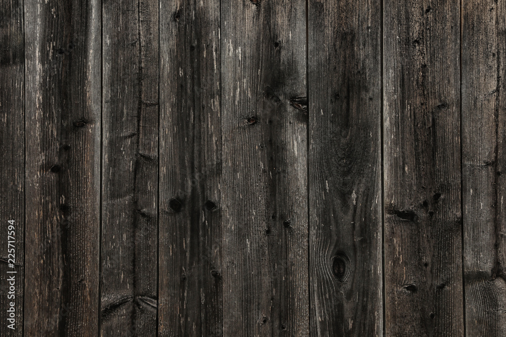 Texture of dark wooden surface as background, closeup view Texture of dark wooden surface as background, closeup view