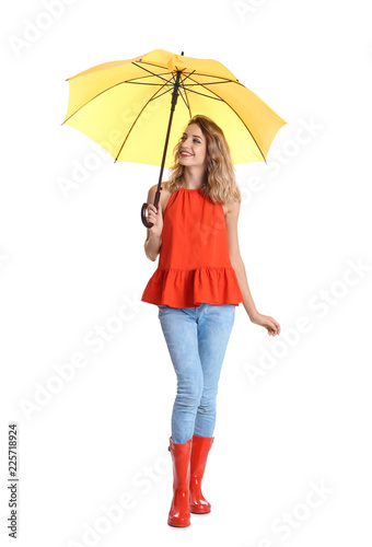 Woman with yellow umbrella on white background