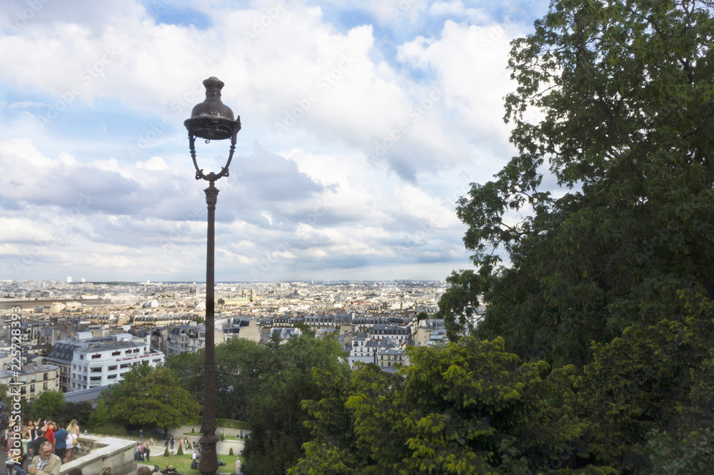 Panoramic view of Parisian rooftops from The Basilica of the Sacred Heart of Paris, commonly known as SacrÃ©-CÅur Basilica and often simply SacrÃ©-CÅur, in Paris, France.