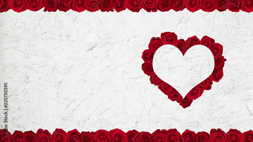 Obraz premium Frame made of red roses on plaster wall.