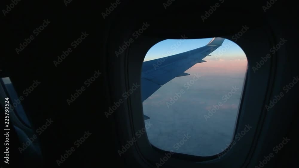 View Out Airplane Window at Sunset View Out Airplane Window at Sunset