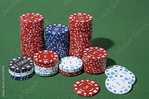 Casino abstract photo. Poker game on red background. Theme of gambling photo