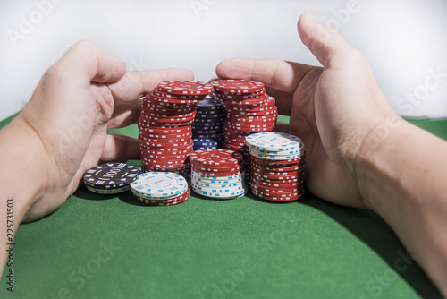 Casino abstract photo. Poker game on red background. Theme of gambling photo