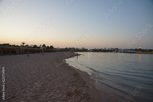 Relax in Egypt on the beach in all inclusive plus Hotel placed near water with waves while swimming