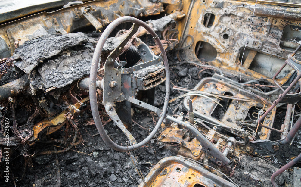 Burned out car after a car accident. Inside view.