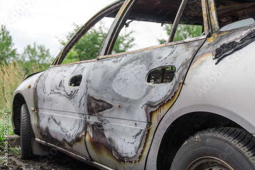 Burned out car after a car accident. Outside view. © M-Production