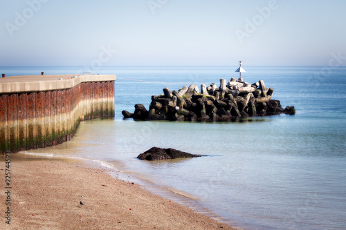 Bild auf Leinwand Harbor entrance protected by dolosse